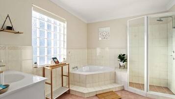 Bathtub, hair dryer, towels