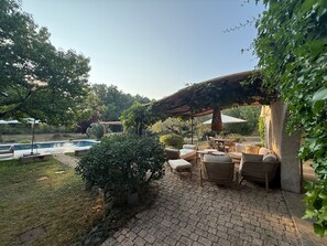 A patio area with outdoor furniture, a pergola, and a swimming pool. - House / Villa - Callian (Callian)