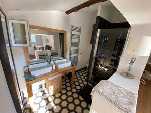 Combined shower/tub, hair dryer, towels, soap