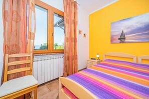 1 dormitorio, tabla de planchar con plancha, cuna de viaje y wifi gratis