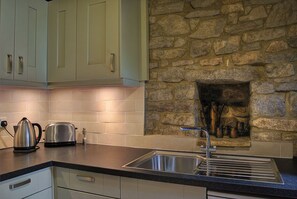 Frigorifero, forno, piano cottura, tostapane