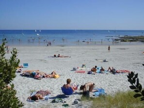 On the beach, beach towels
