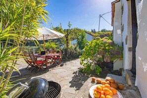 Outdoor dining - GC0001 Holiday cottage with shared pool in Fontanales (Moya)