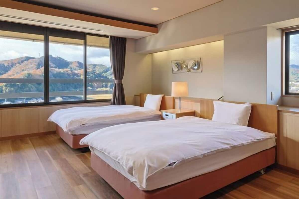 Donzen dekbedden, een minibar, een kluis op de kamer