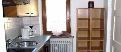 Fridge, stovetop, coffee/tea maker, toaster