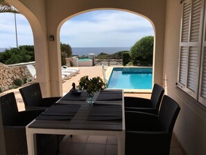 Outdoor dining - House with direct sea view, close to the beach and marina (Cap d'Artrutx)
