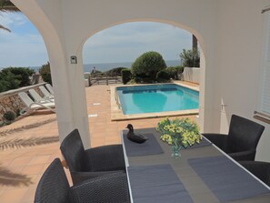 Outdoor dining - House with direct sea view, close to the beach and marina (Cap d'Artrutx)