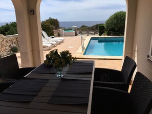Outdoor dining - House with direct sea view, close to the beach and marina (Cap d'Artrutx)