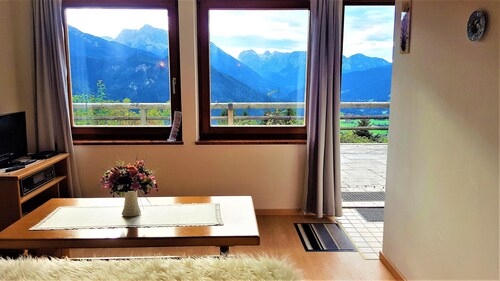 Mountain panorama with a view of the valley, totally alpine pasture landscape