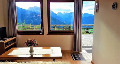 Mountain panorama with a view of the valley, totally alpine pasture landscape