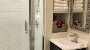 Shower, hair dryer, towels