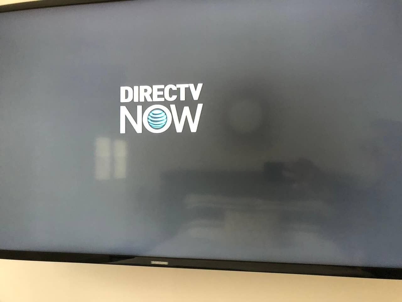 A flat-screen TV with the DIRECTV NOW logo on its screen.