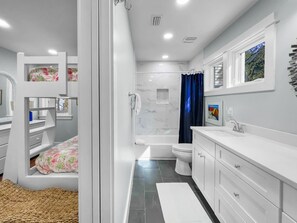 Bathtub, hair dryer, towels