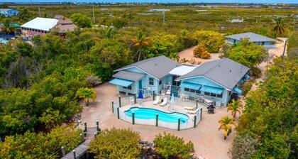 Waterfront Beach Houses with Dock & Heated Pool!