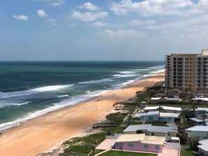On the beach, sun-loungers, beach towels