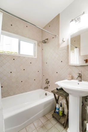 A bathroom with a bathtub, a shower, a sink, and a window. - #C 1-level, 2Bd, 1Block to Beach, Esplanade, Shops (Redondo Beach)