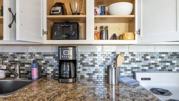Coffee/tea maker, fridge, microwave, oven