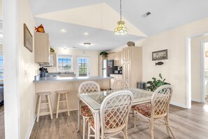 Dining - No Worries: Spacious, well-equipped kitchen, covered porch, located diagonally a (Oak Island)