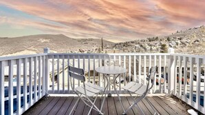 A wooden deck with a white railing, two chairs, and a small table. - Ski-In/Ski-Out, Hot Tub, Walk to Main Street (Park City)