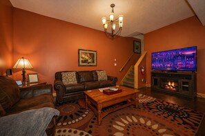 Smart TV, fireplace, DVD player, smart speakers