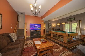 Smart TV, fireplace, DVD player, smart speakers