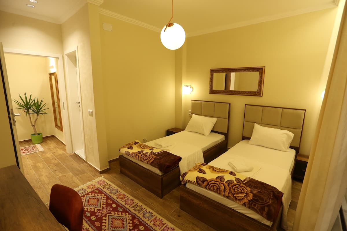 Economy Twin Room, City View | Minibar, free cribs/infant beds, free WiFi