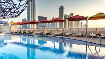 Outdoor pool, open 7:00 AM to 8:00 PM, pool umbrellas, sun loungers