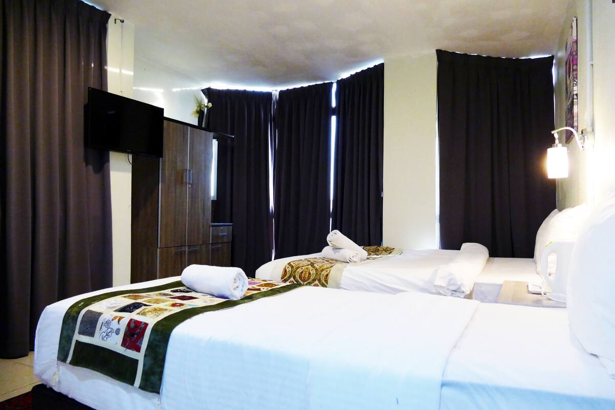 Triple Room | Premium bedding, individually decorated, blackout curtains