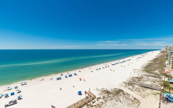Enjoy sunbathing and relaxation on the beach, with umbrellas and chairs available. The hotel offers a pool and sun deck overlooking the ocean.