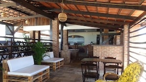 BBQ/picnic area - Pousada Genipabu Praia in Mare (Extremoz)