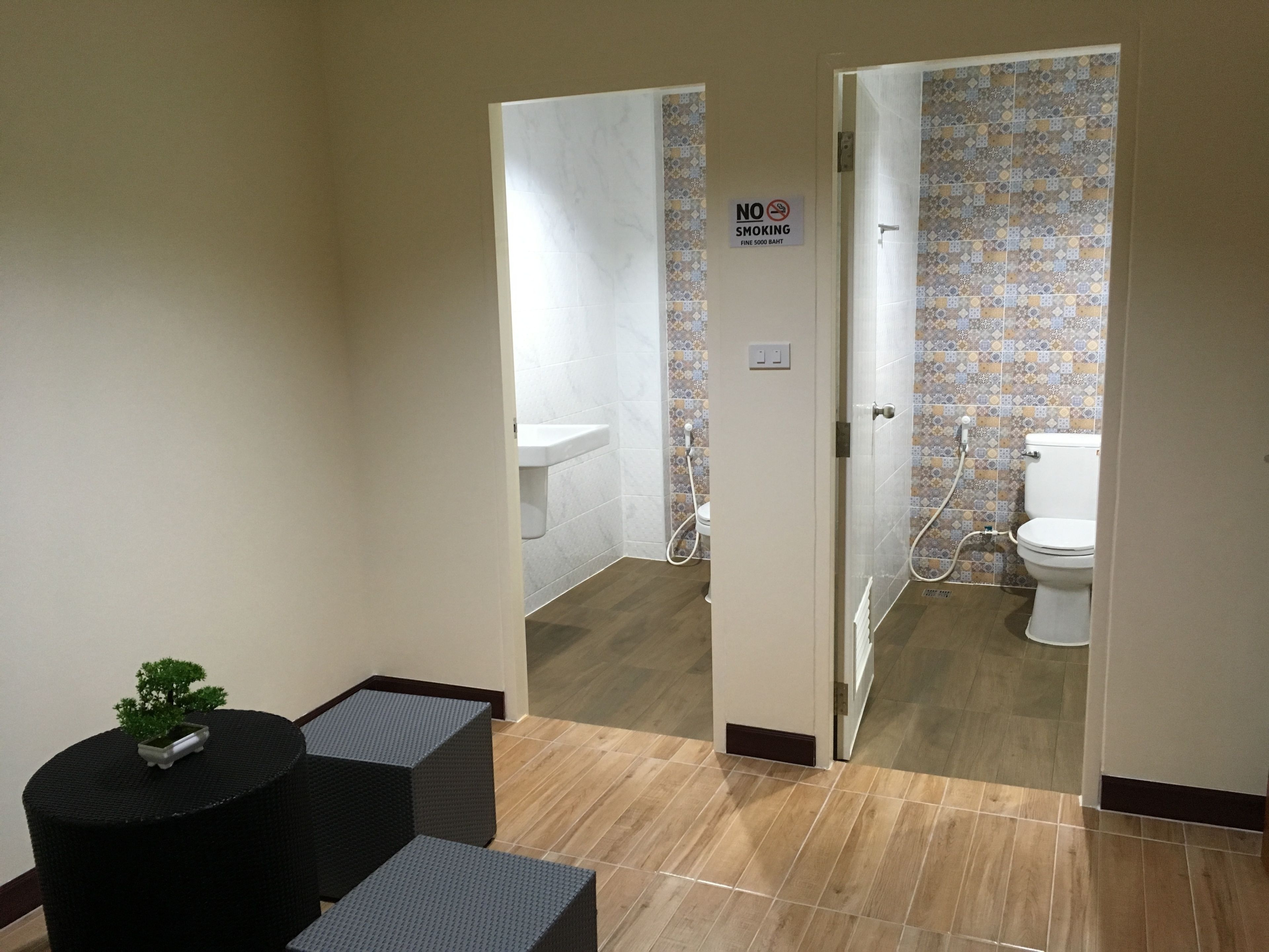 basic shared dormitory, 1 single bed (female only) | bathroom | shower, hair dryer, towels