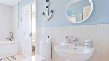 Combined shower/tub, hair dryer, towels, soap