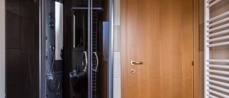 Shower, jetted bath, hair dryer, bidet