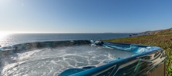 Incredible Ocean Front Home with 3 Master Suites and Secluded Beach