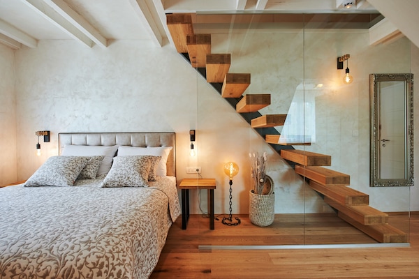 Luxury Triple Room, Non Smoking, Mountain View | Minibar, in-room safe, individually decorated, individually furnished