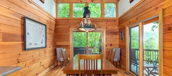 Laurel View Lodge is a 3 bedroom, 3 bath log home, beautiful view, game room, hot tub, pet friend...