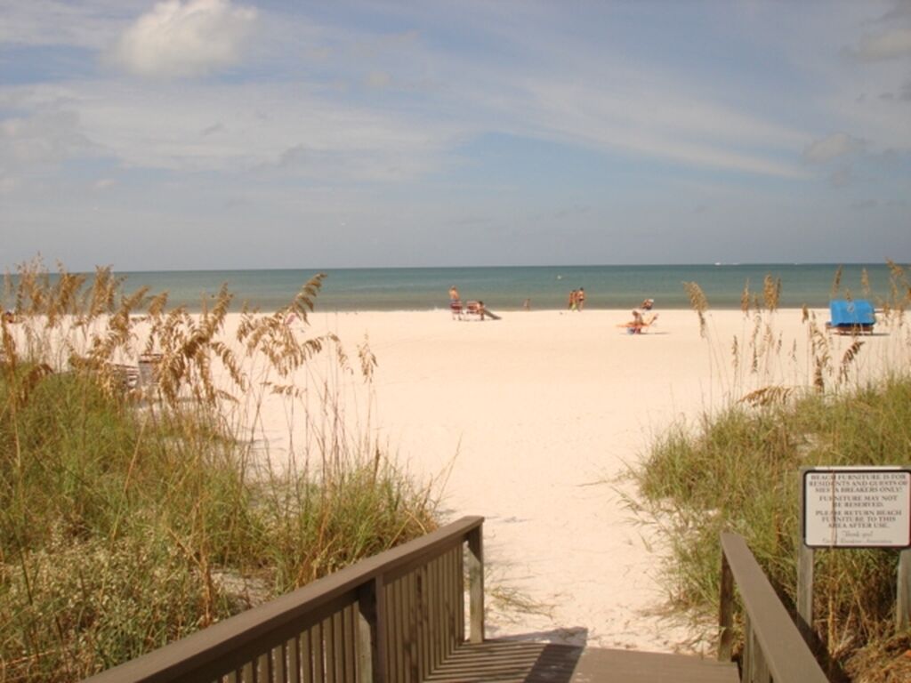 On the beach, sun-loungers