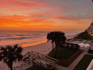 On the beach, sun-loungers