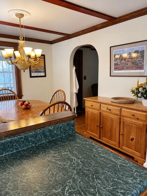 Enjoy good food and great company in the dining room, just off the kitchen.