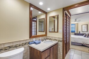 Shower, hair dryer, towels, toilet paper