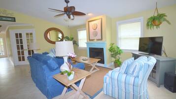 Smart TV, fireplace, DVD player, books