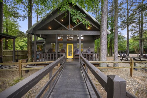 Kingfisher ~ Riverfront cabin with play set, hot tub, kayaks, and river access