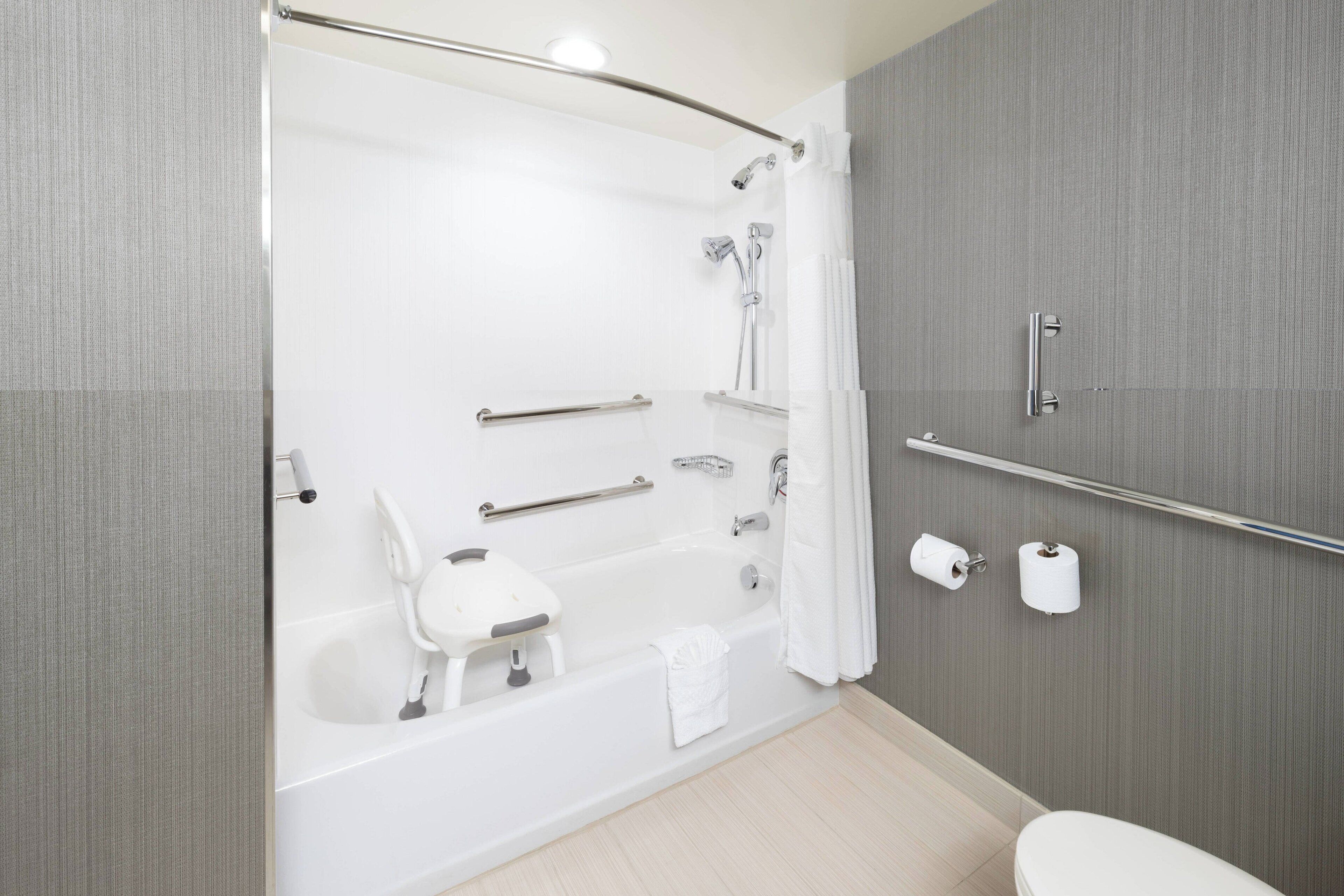 shower, free toiletries, hair dryer, towels