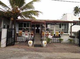 Breakfast, lunch, dinner served; local cuisine 