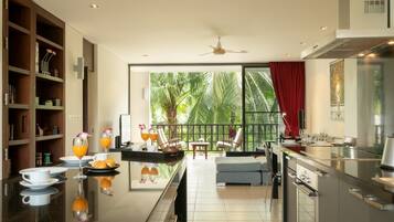 2-Bedroom Apartment | Private kitchenette | Full-sized fridge, microwave, stovetop, cookware/dishes/utensils