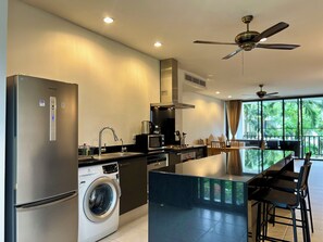 2-Bedroom Apartment | Private kitchen | Full-sized fridge, microwave, stovetop, cookware/dishes/utensils - Bangtao Beach Garden By RESAVA (Choeng Thale)