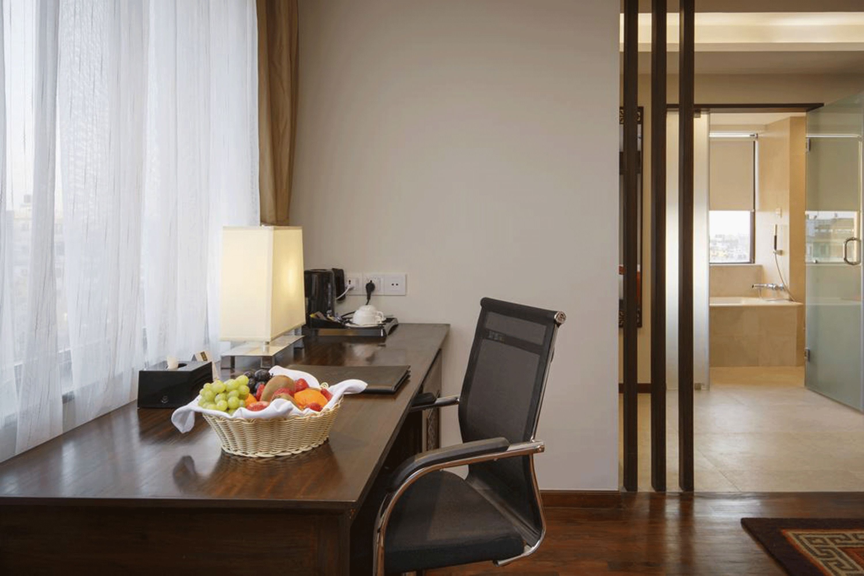 deluxe twin room, bathtub, city view | premium bedding, minibar, in-room safe, desk