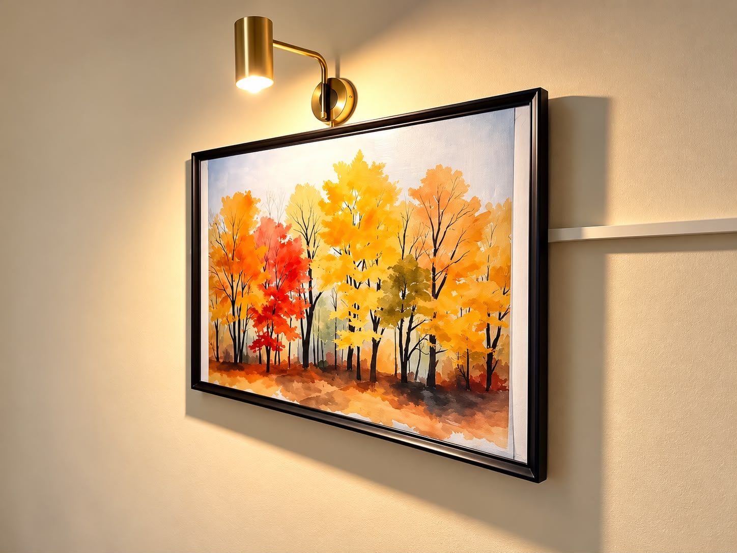A framed painting of autumn trees on a wall.