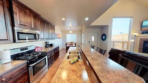 Coffee/tea maker, fridge, microwave, oven