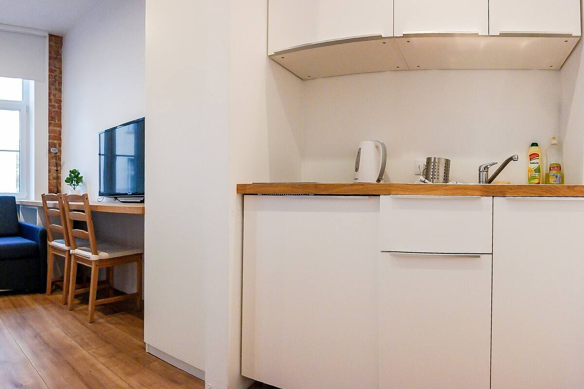 Triple Room, Kitchenette | Blackout curtains, iron/ironing board, free WiFi, bed sheets